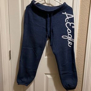 Womans American eagle sweatpants size XS with logo on side.